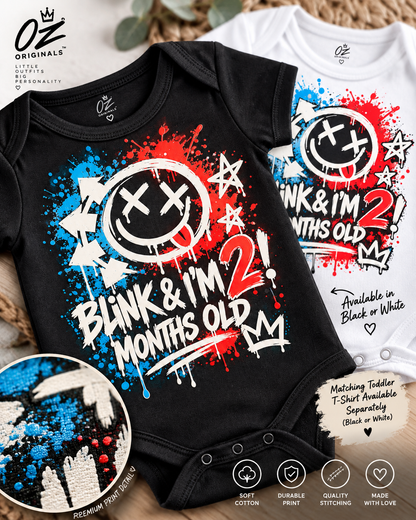 Blink & I’m 2 Months Old Baby Vest – Black or White | Alternative Baby Clothing